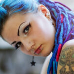 unconscious bias woman blue hair braids